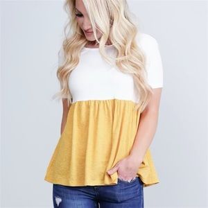 White and mustard/yellow peplum top